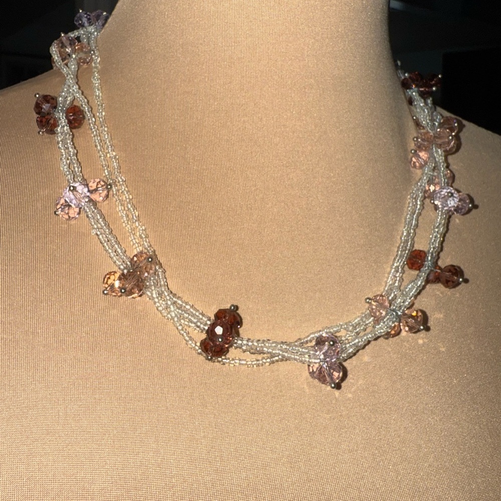 Shimmering Beaded Necklace with White, Brown and Pink Accents.